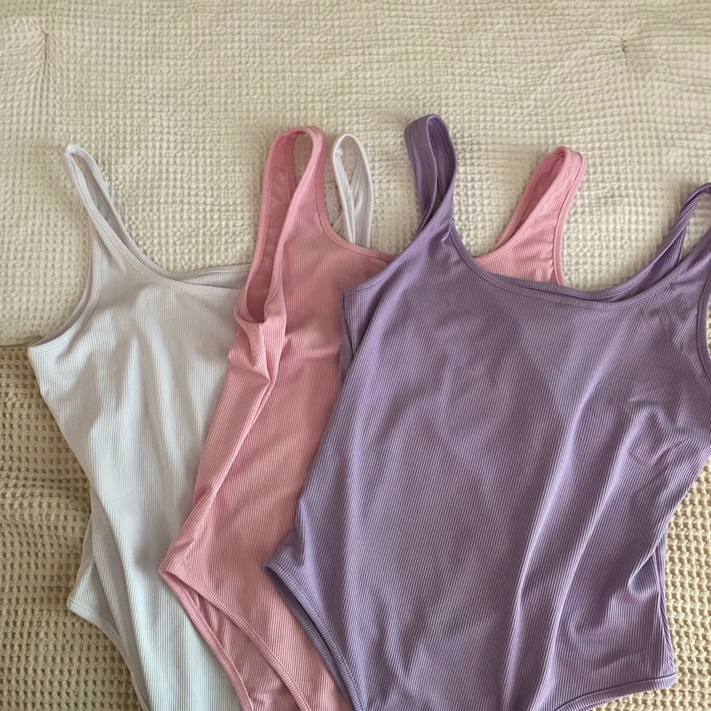 Ribbed bodysculpt Bodysuits in White, Pink, and Purple